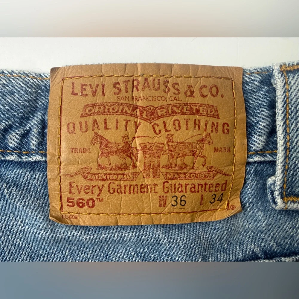 VTG Levi's 560‎ Loose Fit Tapered Leg 36x34 Blue Denim Red Tab 90's Retro Baggy